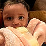 Jazzlyn is registered to the contest to win money with this photo: baby, beverage, blanket, bodypart, dairy, drinking, eating, face, finger, food, hand, head, medication, newborn, person, photography, pill, portrait, tape, towel