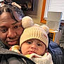 Jazzlyn is registered to the contest to win money with this photo: baby, cap, clothing, coat, computerhardware, couch, electronics, face, furniture, hardware, hat, head, indoors, jacket, people, person, photography, portrait, screen, selfie