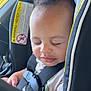 Ares joined the competition — help win amazing prizes! baby, child, car_seat, seatbelt, closed_eyes, sleeping, infant, safety, transportation, child_safety, car_interior, clothing, hair, face, peaceful, seat, straps, warning_label, vehicle, portrait
