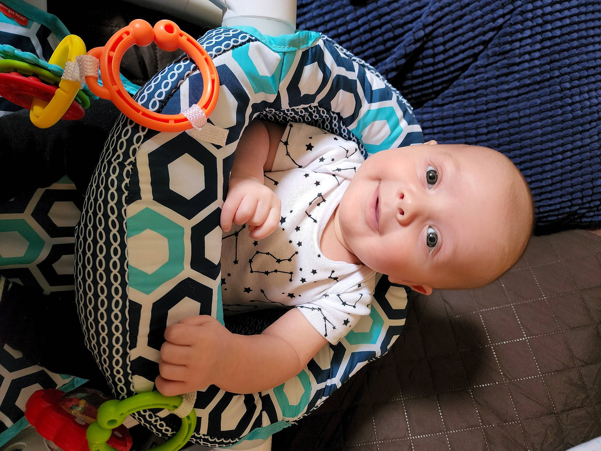 Bentlee is registered to the contest to win money with this photo: baby, baby_products, baby_toddler_clothing, baby_toys, child, cool, fashion_accessory, fun, happy, headgear, joy, nail, orange, pattern, person, play, room, sitting, smile, stuffed_toy