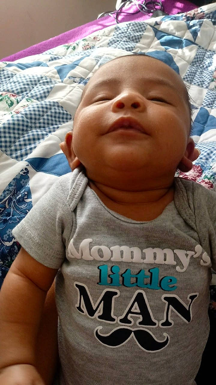 Kylani is registered to the contest to win money with this photo: baby, cheek, child, cool, facial_expression, forehead, head, headwear, person, smile, t_shirt, toddler