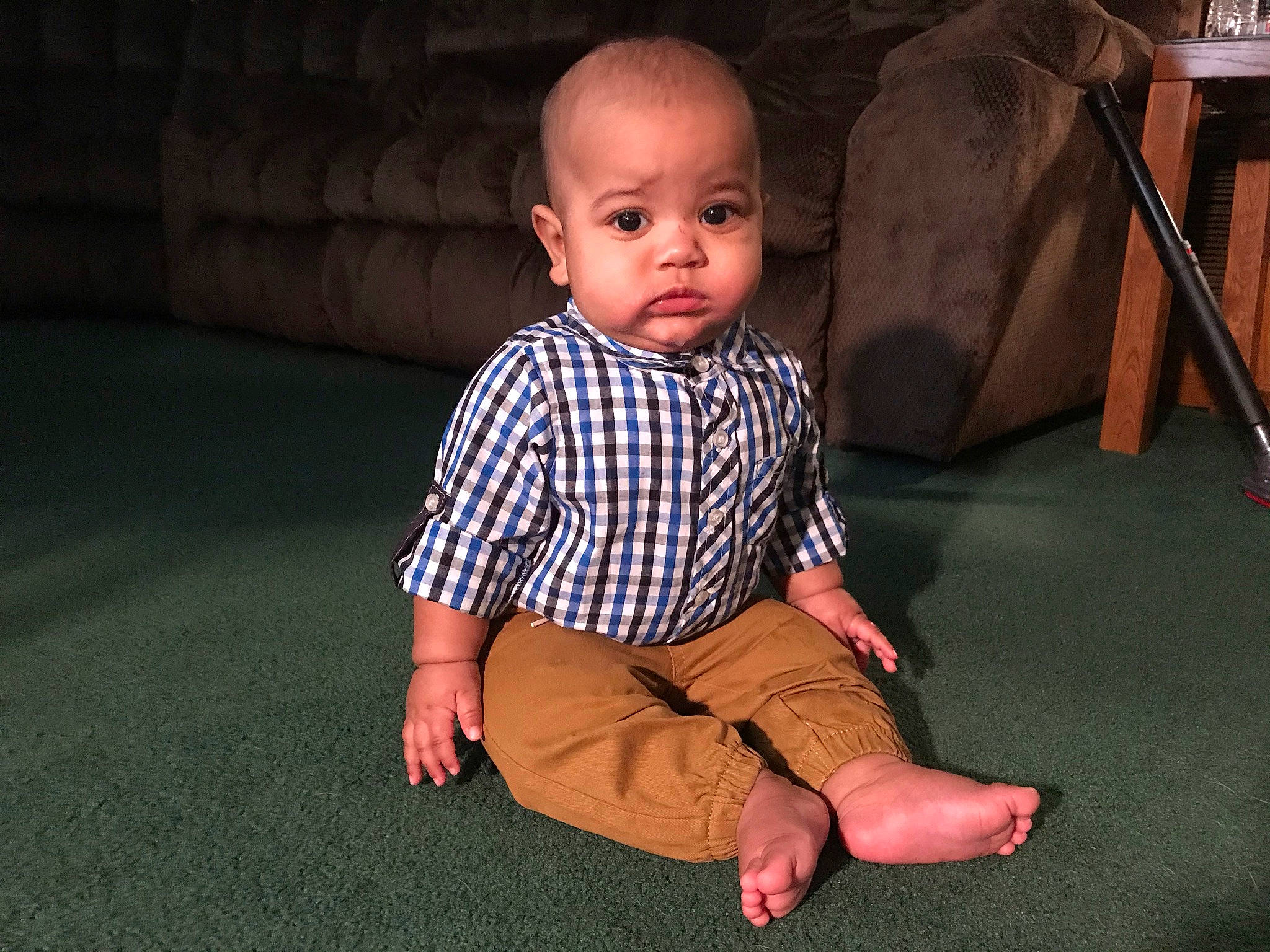 Mikel joined the competition — help win amazing prizes! baby, baby_toddler_clothing, barefoot, cheek, child, ear, finger, floor, flooring, foot, joint, pattern, person, plaid, sitting, skin, sleeve, sock, tartan, toddler