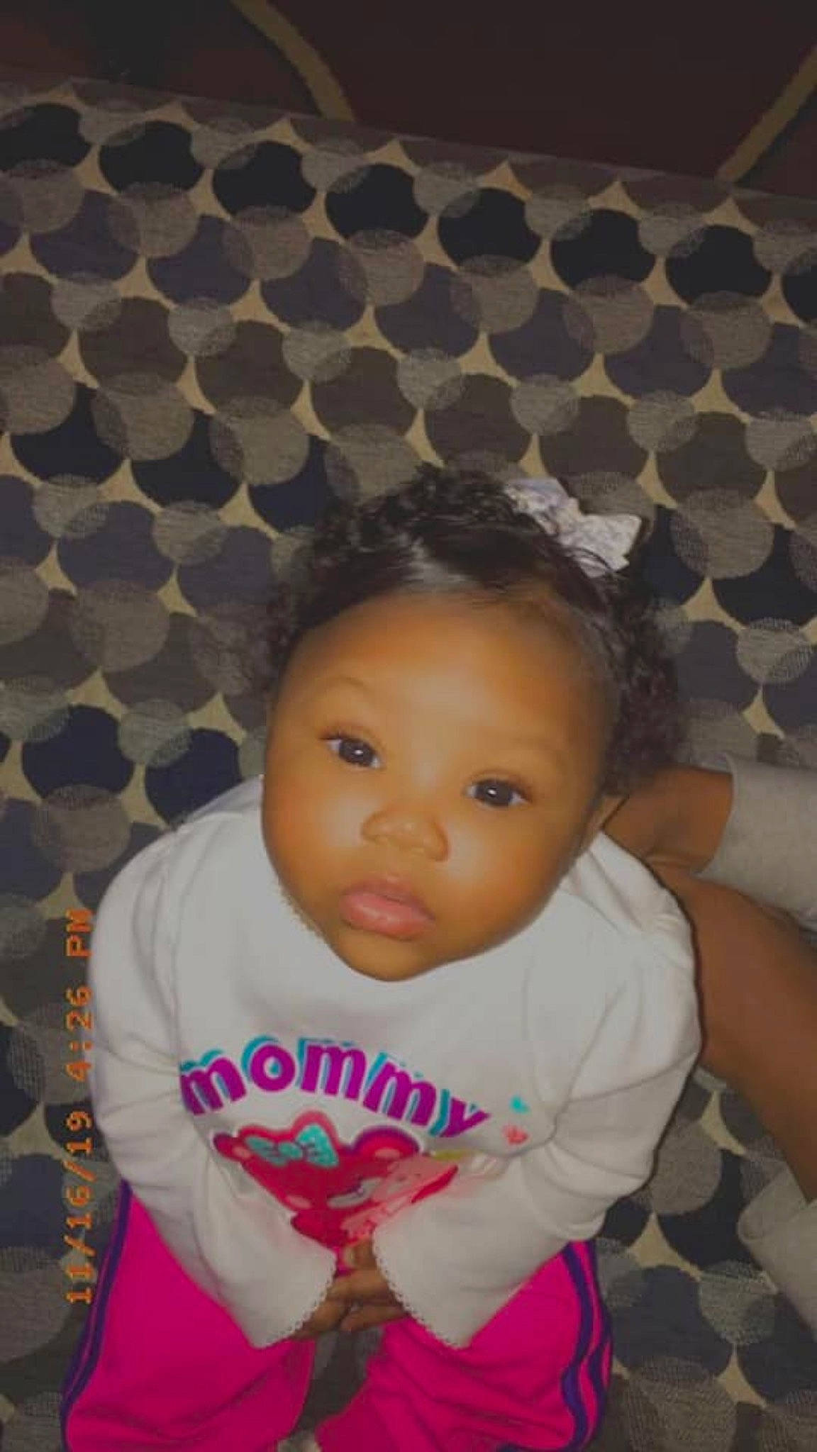 Ayla is registered to the contest to win money with this photo: baby, black_hair, cheek, child, cool, eye, face, forehead, fun, hair, head, iris, lip, nose, person, pink, skin, smile, toddler