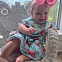 baby, child, girl, smile, pink_bow, floral_dress, wicker_chair, indoor, window, lake_view, nature, wooden_floor, happy, cute, portrait, seated, foot, hand, headband, daylight