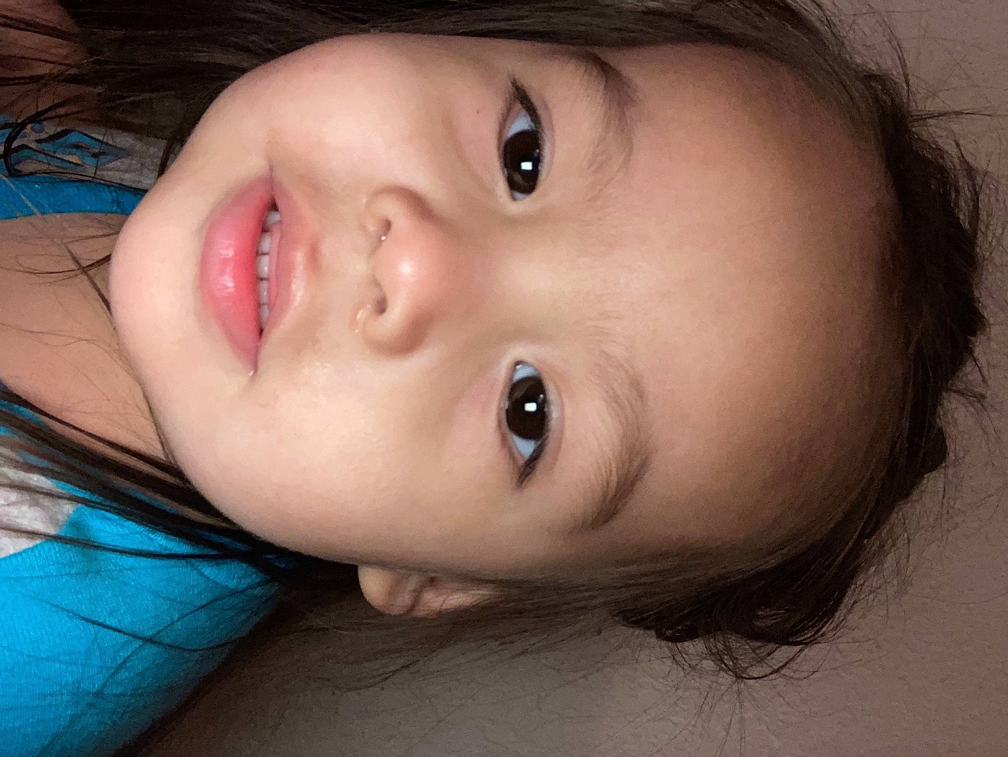 Julius is registered to the contest to win money with this photo: arm, black_hair, blue, cheek, ear, eyebrow, eyelash, flash_photography, forehead, happy, human_body, iris, jaw, lip, mouth, neck, nose, person, skin, smile