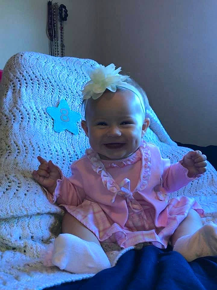 Avah is registered to the contest to win money with this photo: baby, child, joy, person, sitting, skin, smile, textile, toddler