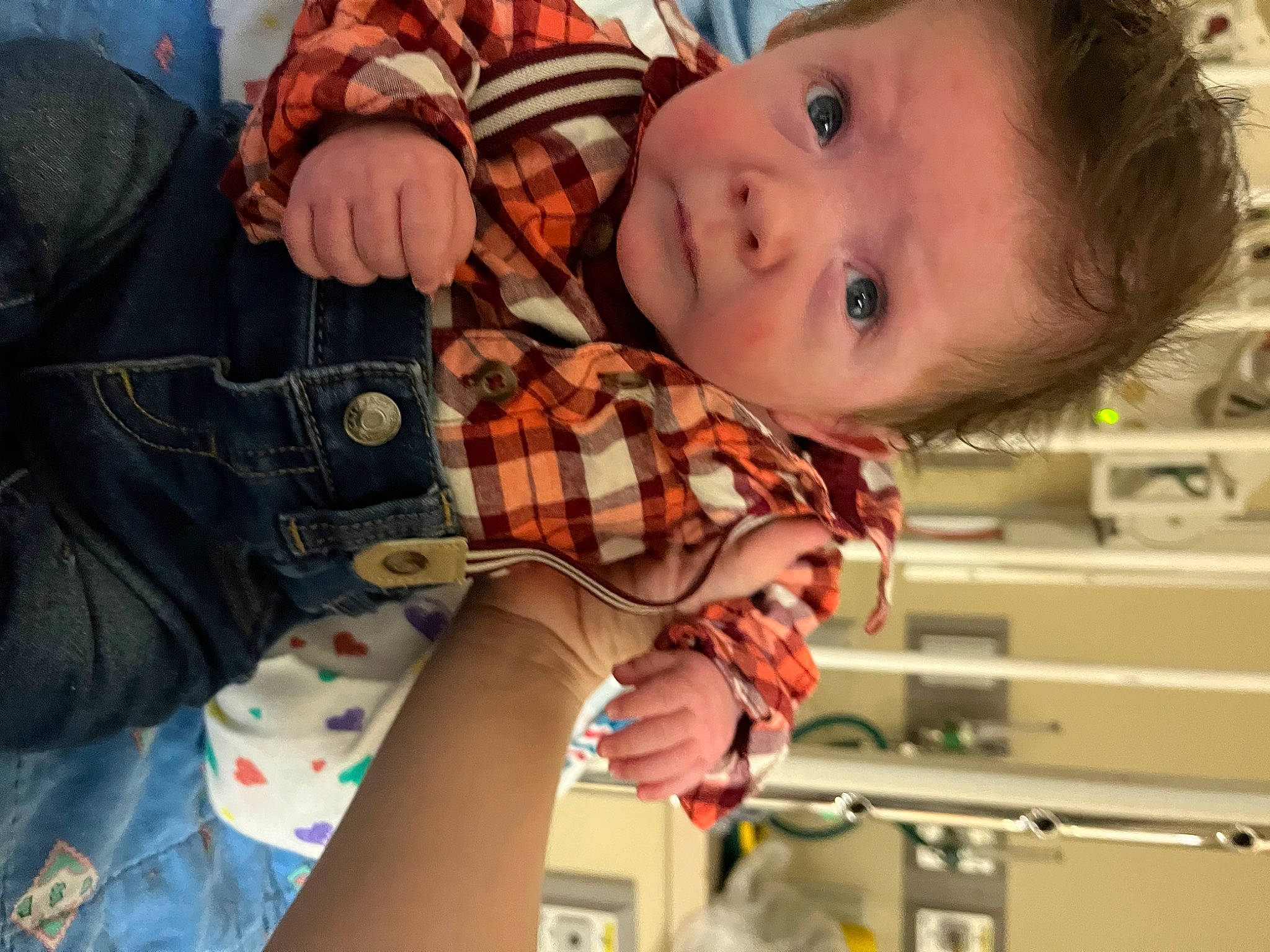 Braxton is registered to the contest to win money with this photo: arm, baby, cheek, child, eye, fun, hand, happy, head, mouth, nose, pattern, person, plaid, skin, sleeve, tartan, textile, toddler, vacation