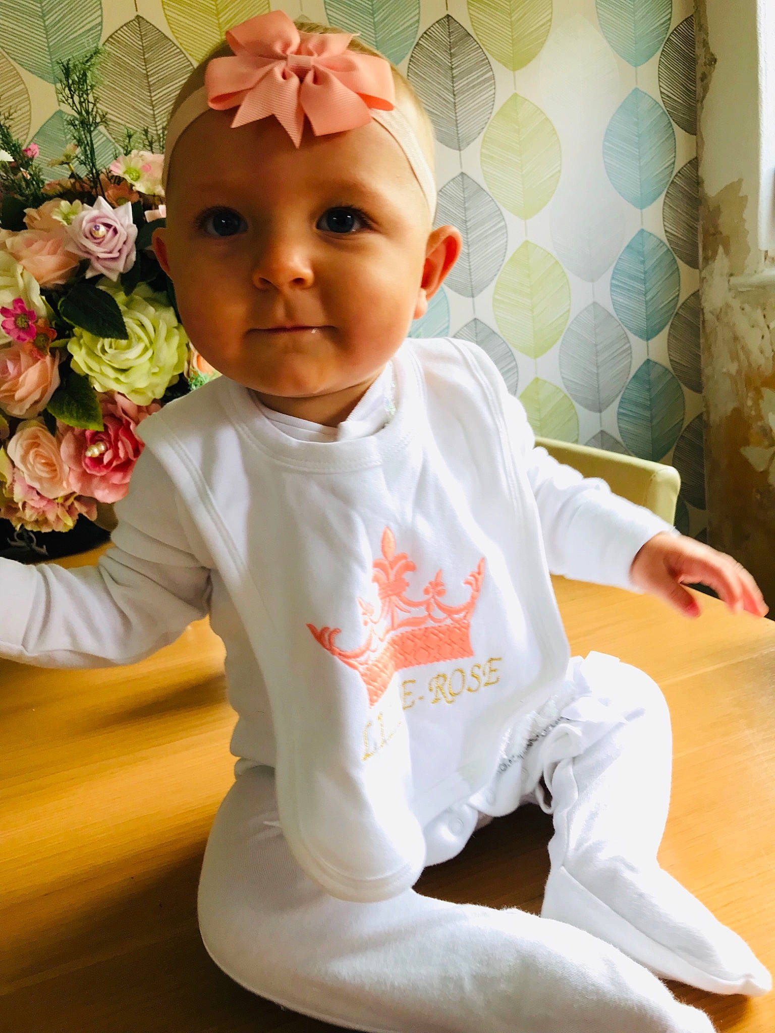 Lillie-rose joined the competition — help win amazing prizes! baby, baby_toddler_clothing, child, fashion_accessory, hair_accessory, happy, headband, headgear, person, pink, sitting, sleeve, smile, toddler