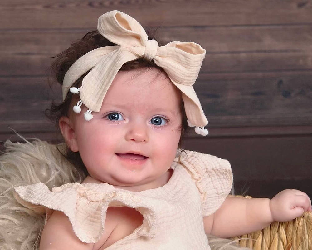 Allison joined the competition — help win amazing prizes! baby_toddler_clothing, dress, ear, eye, eyebrow, eyelash, face, fawn, happy, head, headgear, headpiece, headwear, iris, lip, neck, outerwear, person, pink, skin