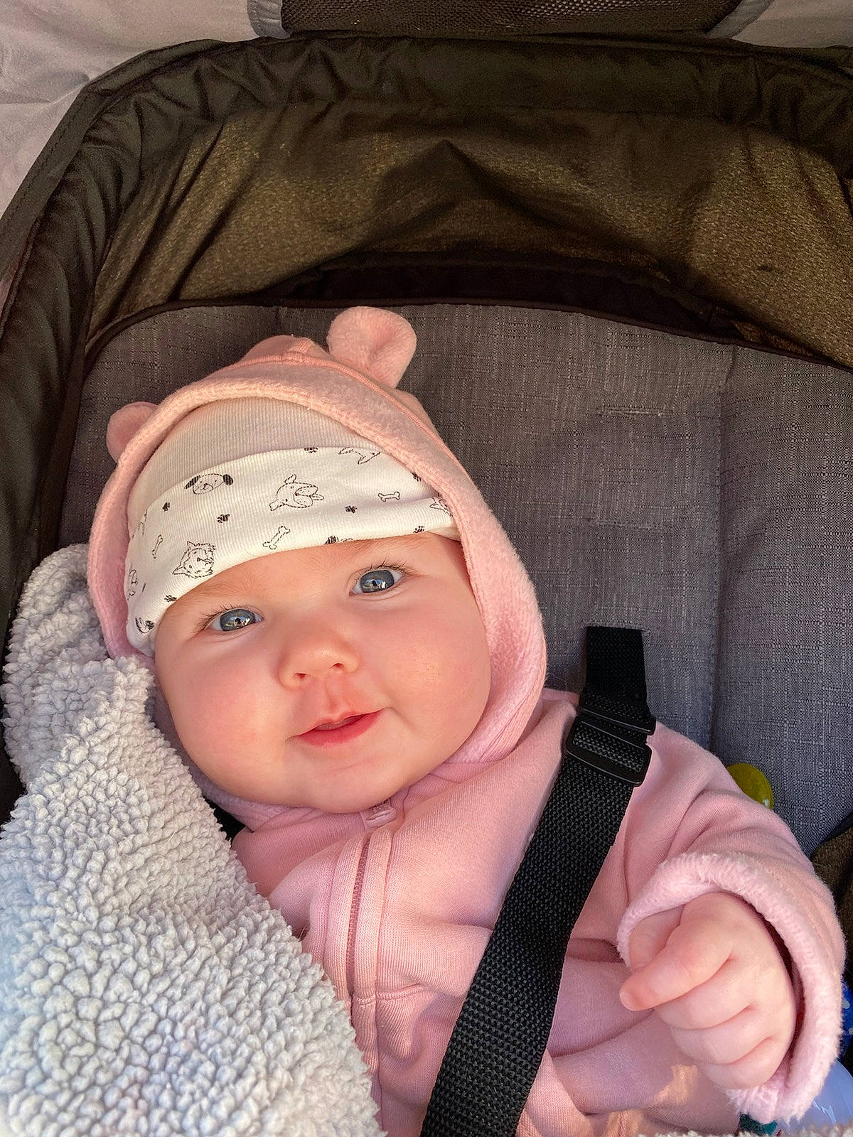 Rosalee joined the competition — help win amazing prizes! baby, baby_toddler_clothing, cap, cheek, child, comfort, eyebrow, face, finger, gesture, happy, headwear, human_body, knit_cap, nose, outerwear, person, skin, sleeve, smile