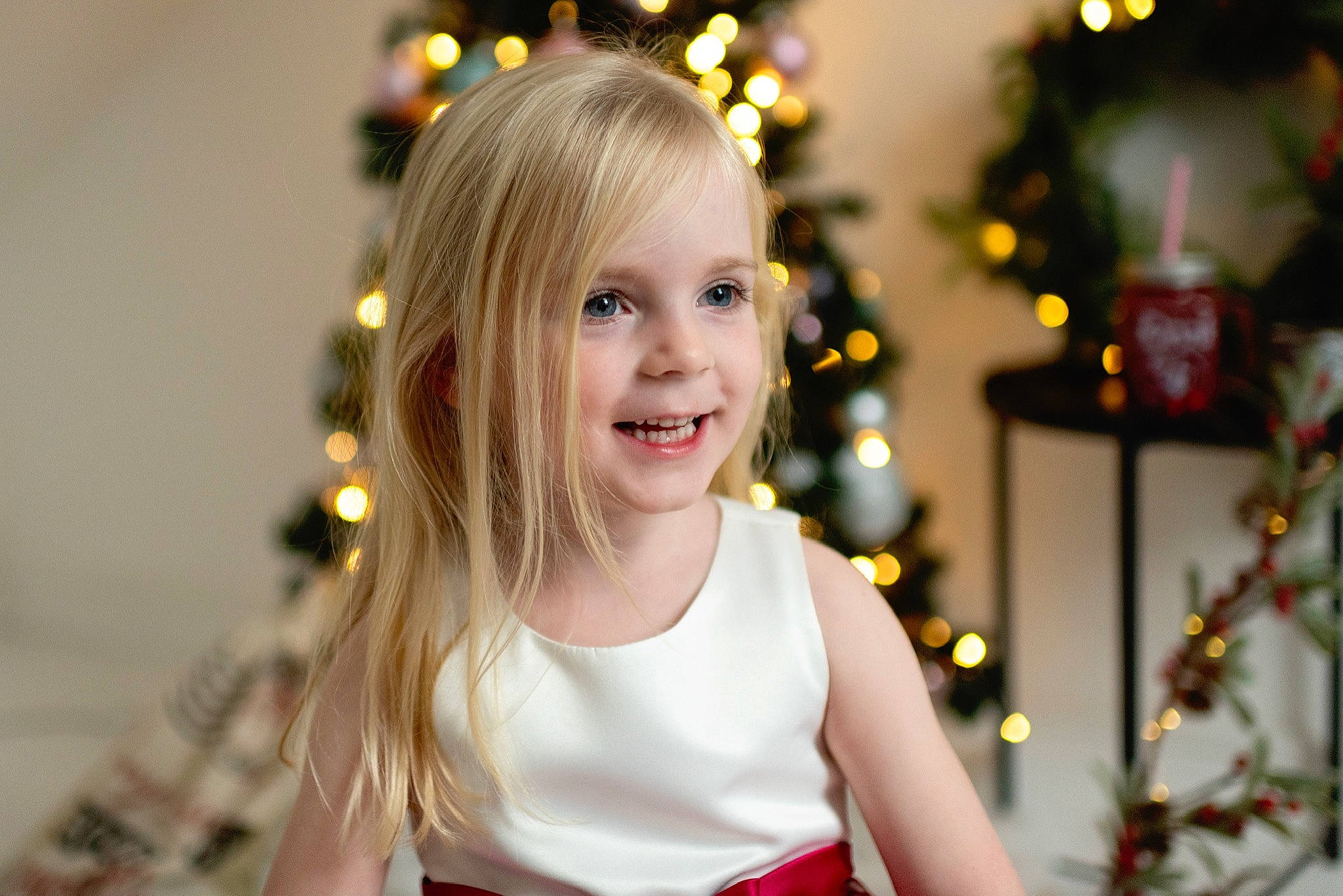 Louise joined the competition — help win amazing prizes! blond, child, christmas, christmas_decoration, christmas_eve, christmas_ornament, christmas_tree, event, facial_expression, fun, hair, hairstyle, happy, holiday, interior_design, joy, long_hair, person, photography, smile