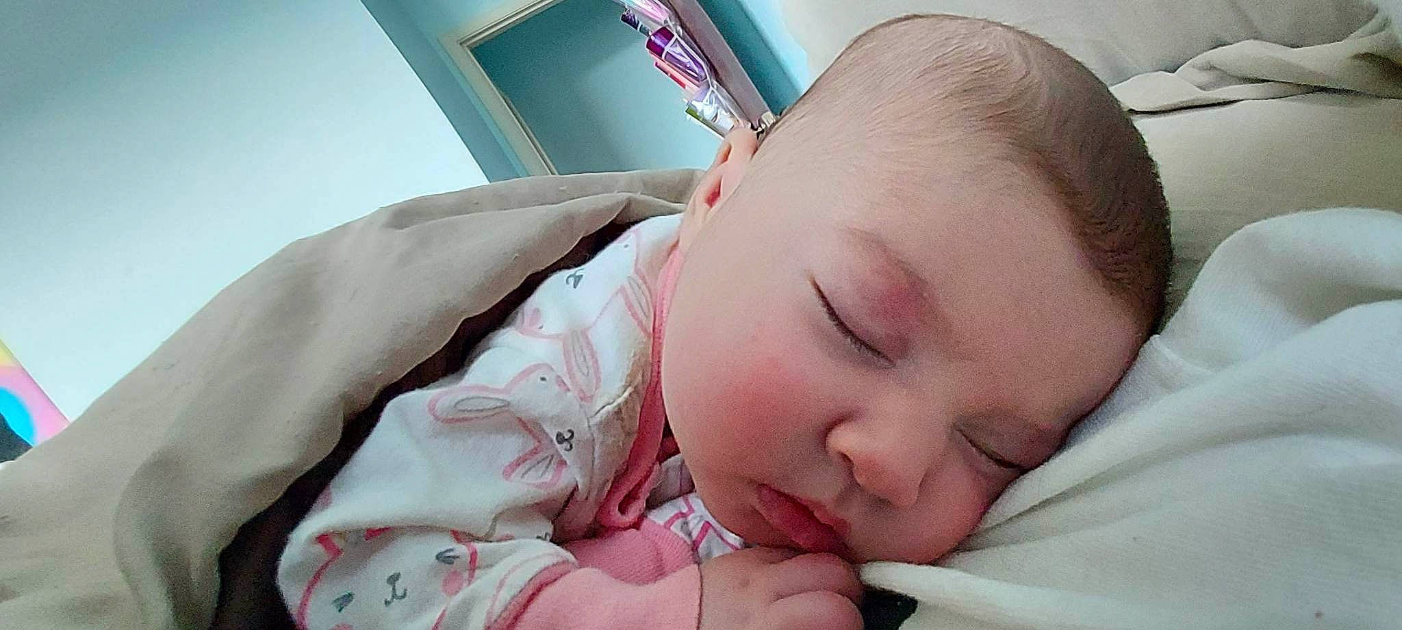 Isabella joined the competition — help win amazing prizes! baby, baby_products, baby_sleeping, baby_toddler_clothing, bedding, bedtime, cheek, child, comfort, ear, eyelash, gesture, happy, linens, nap, nose, person, skin, sleep, thumb