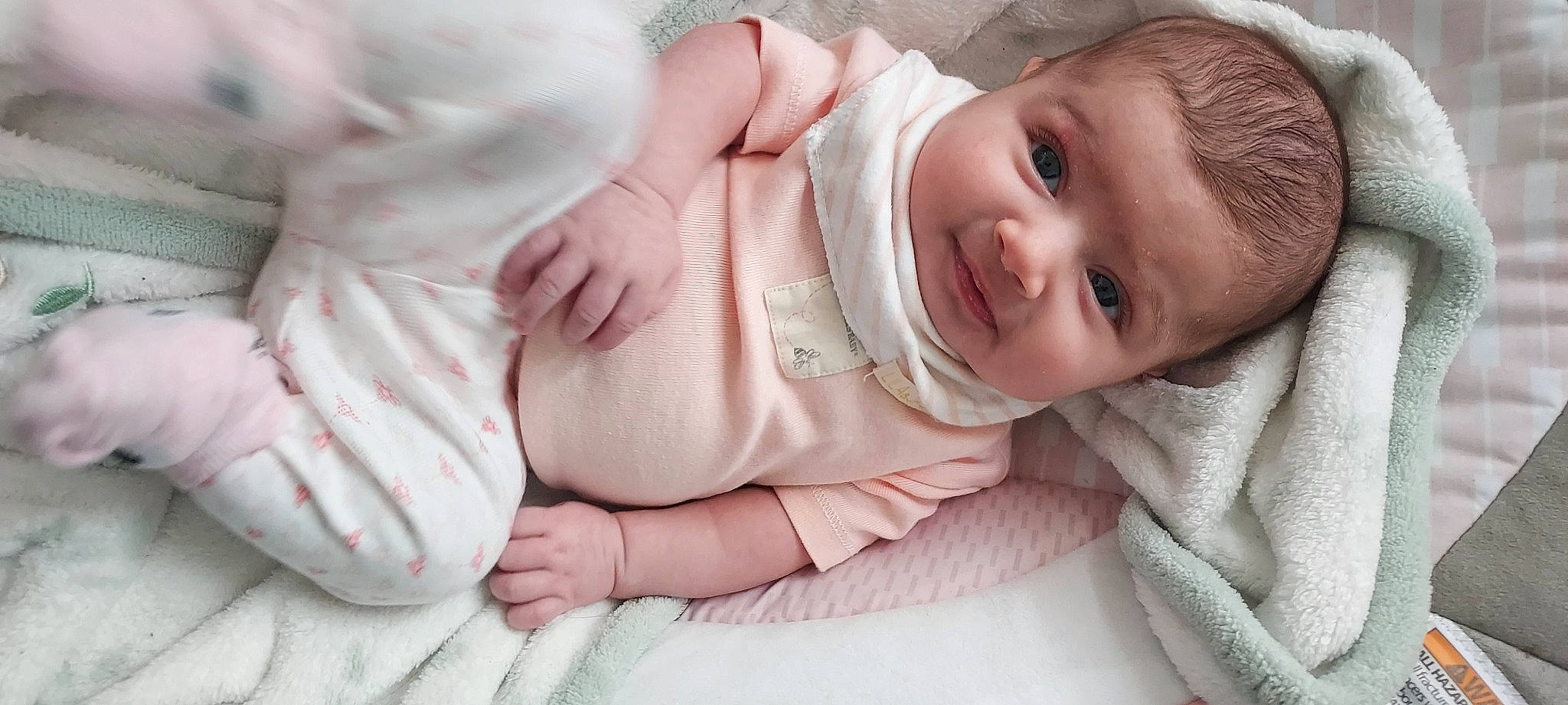 Isabella joined the competition — help win amazing prizes! baby, baby_sleeping, baby_toddler_clothing, cheek, chin, comfort, finger, gesture, hand, happy, headgear, lip, mouth, nose, person, pink, skin, sleeve, smile, toddler