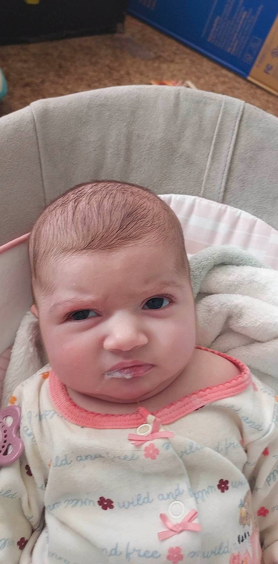 Isabella is registered to the contest to win money with this photo: baby, baby_toddler_clothing, cheek, comfort, ear, eye, eyebrow, eyelash, face, facial_expression, head, iris, lip, mouth, neck, nose, person, pink, skin, sleeve