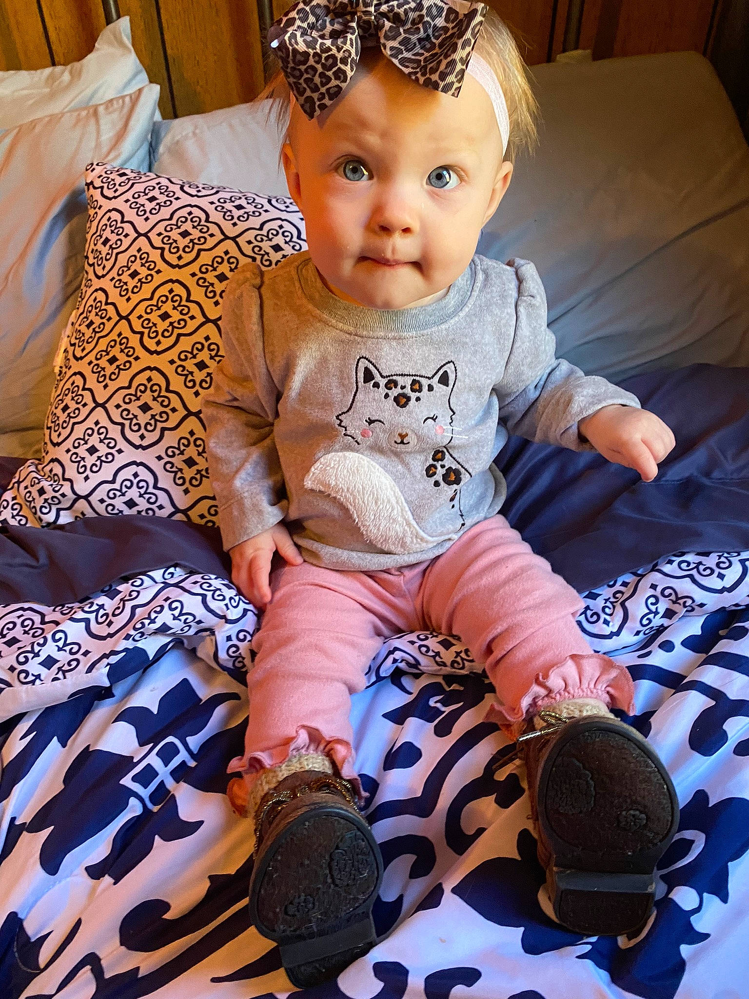 Daenerys is registered to the contest to win money with this photo: baby, baby_toddler_clothing, child, cool, fun, happy, jewellery, necklace, pattern, person, pink, purple, sitting, skin, sleeve, sock, surprise, textile, thigh, toddler