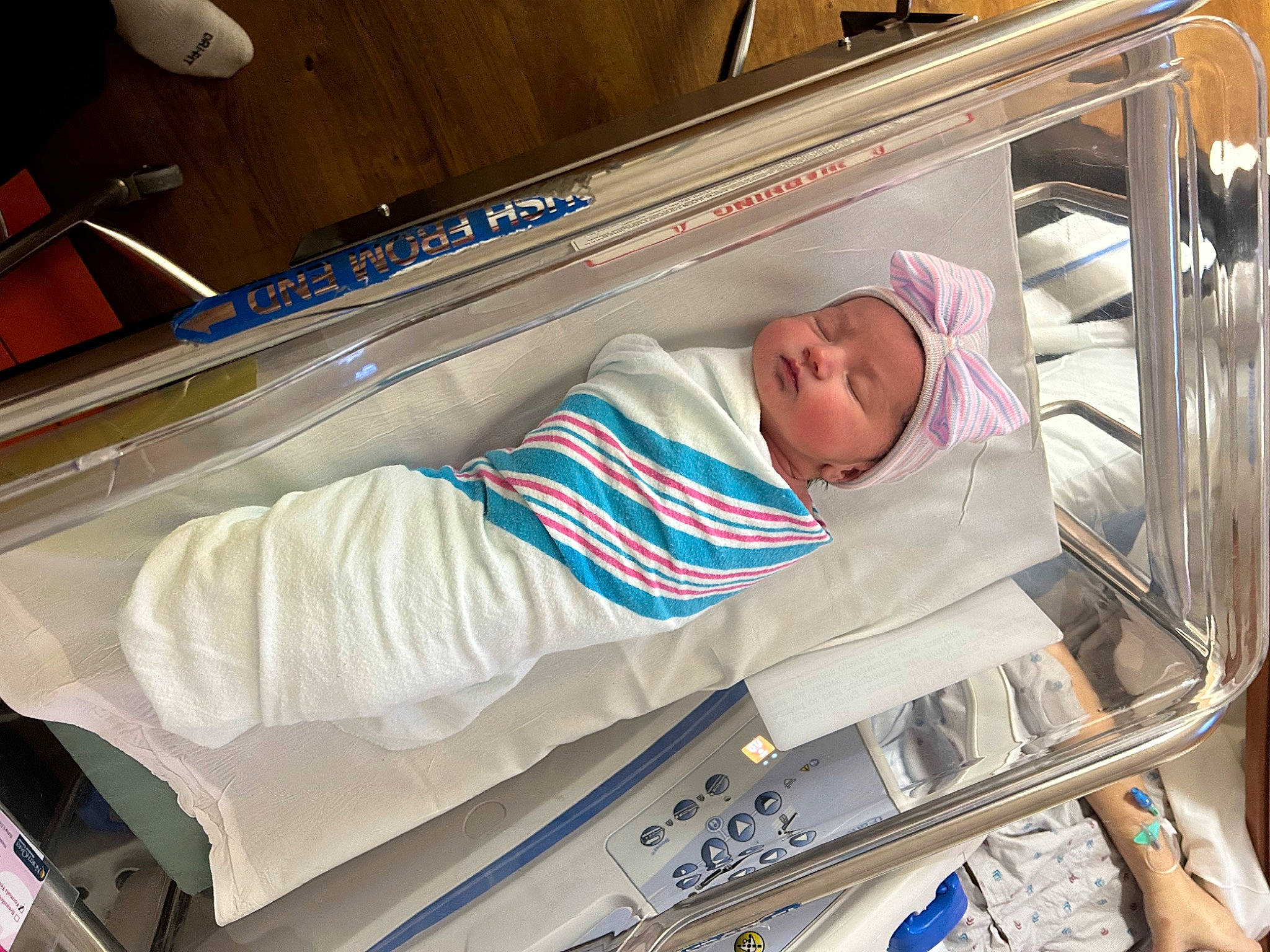 River is registered to the contest to win money with this photo: baby, baby_products, baby_safety, bed, bedding, child, comfort, event, headwear, health_care, hospital, hospital_bed, linens, medical, medical_equipment, patient, person, pillow, product, room