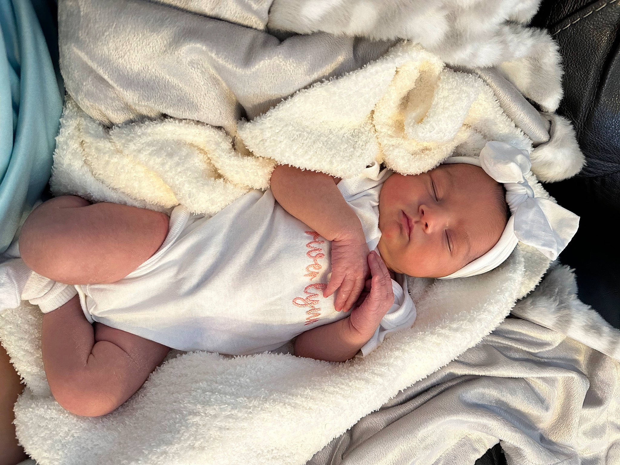 River joined the competition — help win amazing prizes! baby, baby_products, baby_sleeping, baby_toddler_clothing, cheek, child, comfort, finger, foot, gesture, hand, hat, headgear, human_leg, linens, person, skin, sleep, textile, thigh