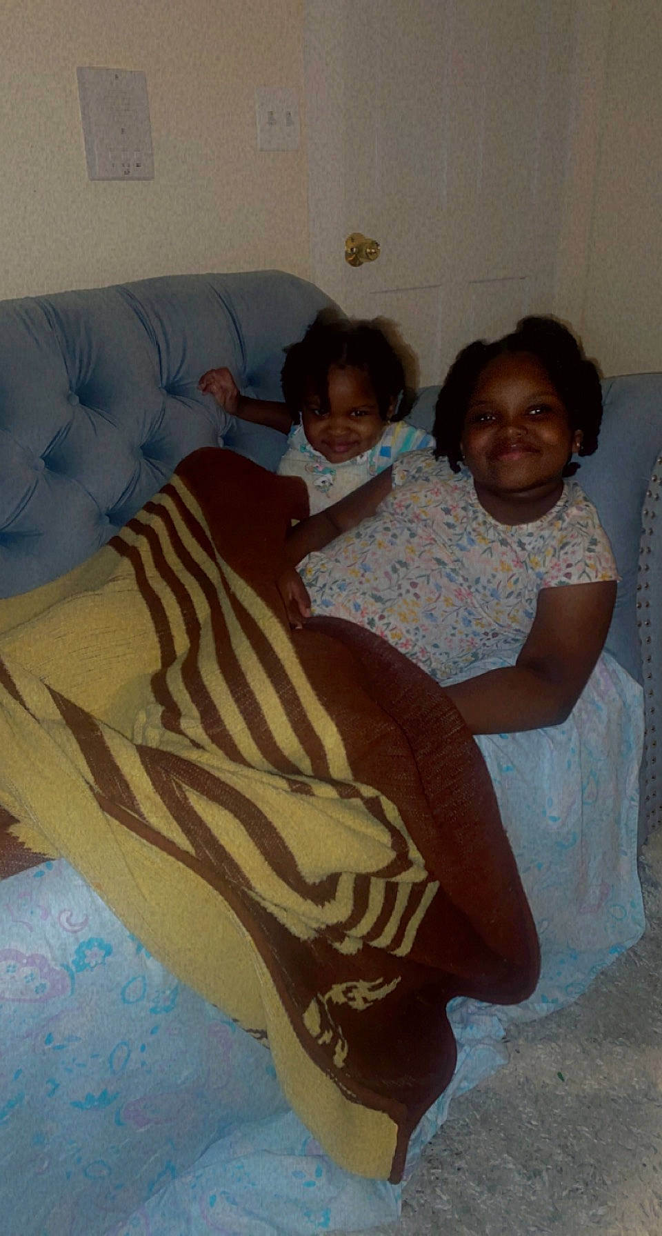 Morgan joined the competition — help win amazing prizes! bed, bed_sheet, bedding, bedroom, child, comfort, event, flooring, fun, happy, human_leg, joy, linens, person, play, room, sitting, smile, t_shirt, textile