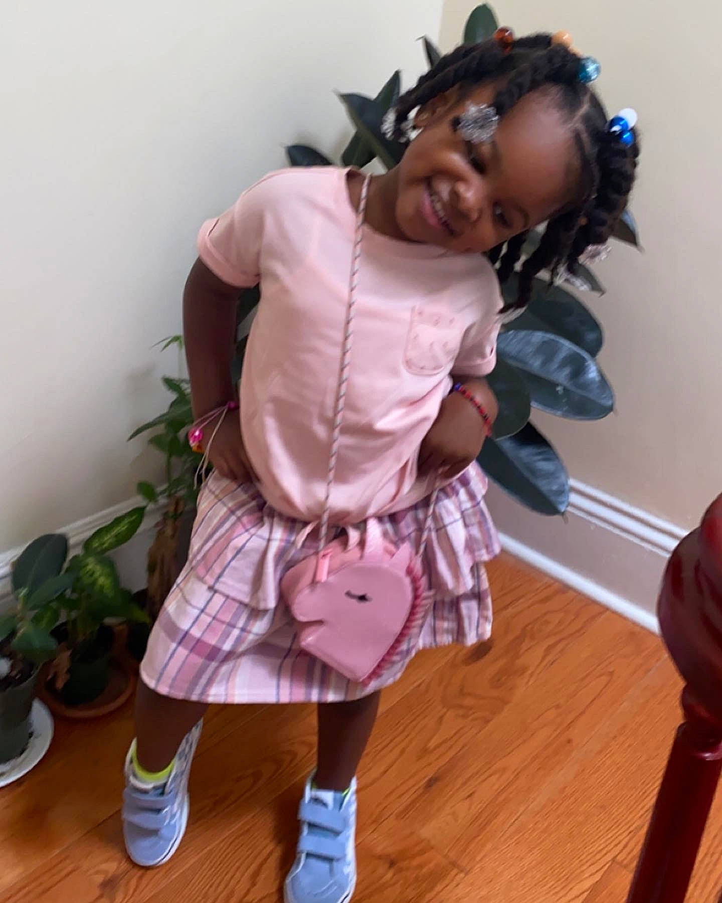 Maila is registered to the contest to win money with this photo: child, costume, fashion_accessory, fashion_design, flooring, flowerpot, fun, happy, hardwood, houseplant, jewellery, joy, magenta, person, plant, purple, room, sock, toddler, toy