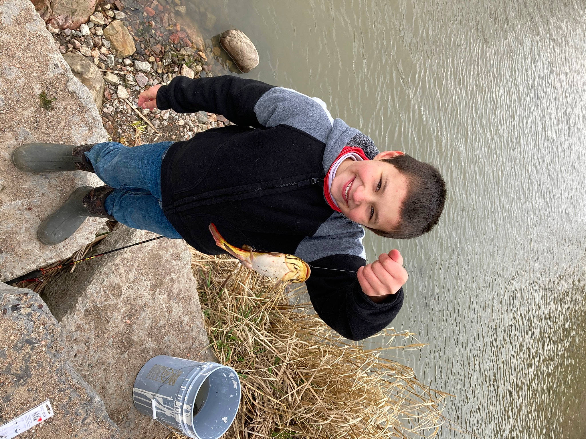 Seth is registered to the contest to win money with this photo: adventure, fun, grass, happy, joy, lake, lake_district, landscape, leisure, people_in_nature, person, recreation, reservoir, rock, smile, soil, travel, tree, water, wood