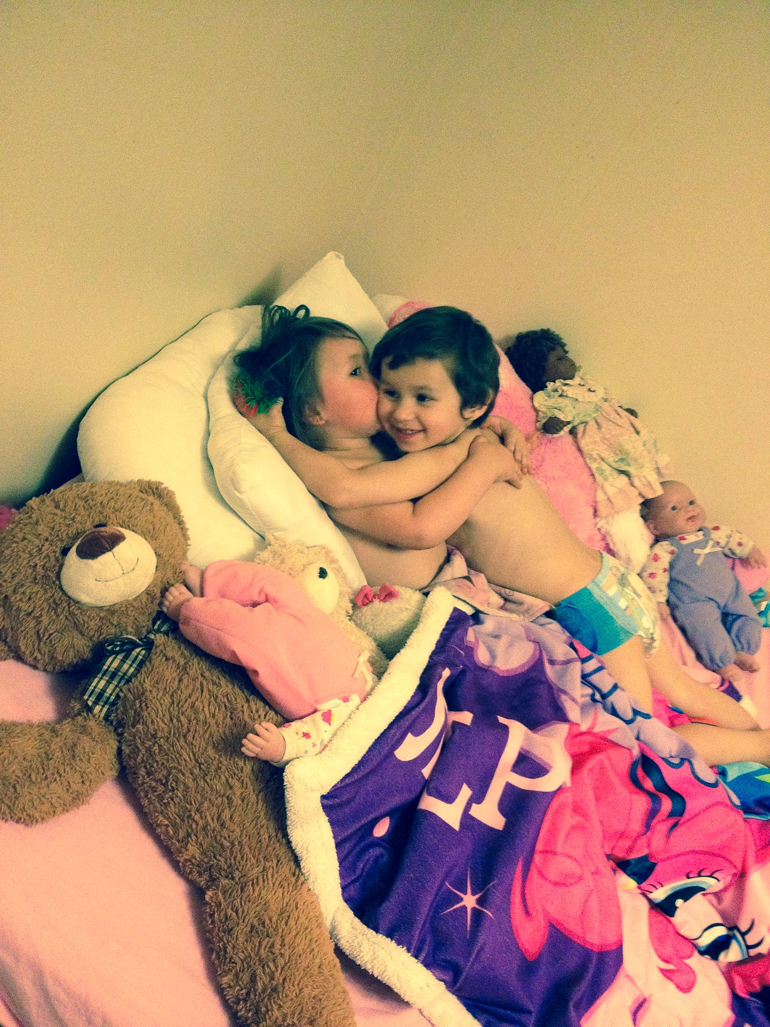 Seth is registered to the contest to win money with this photo: arm, baby, baby_sleeping, bedtime, comfort, cool, finger, flash_photography, gesture, hand, happy, hug, interaction, joy, linens, love, mammal, person, sitting, smile