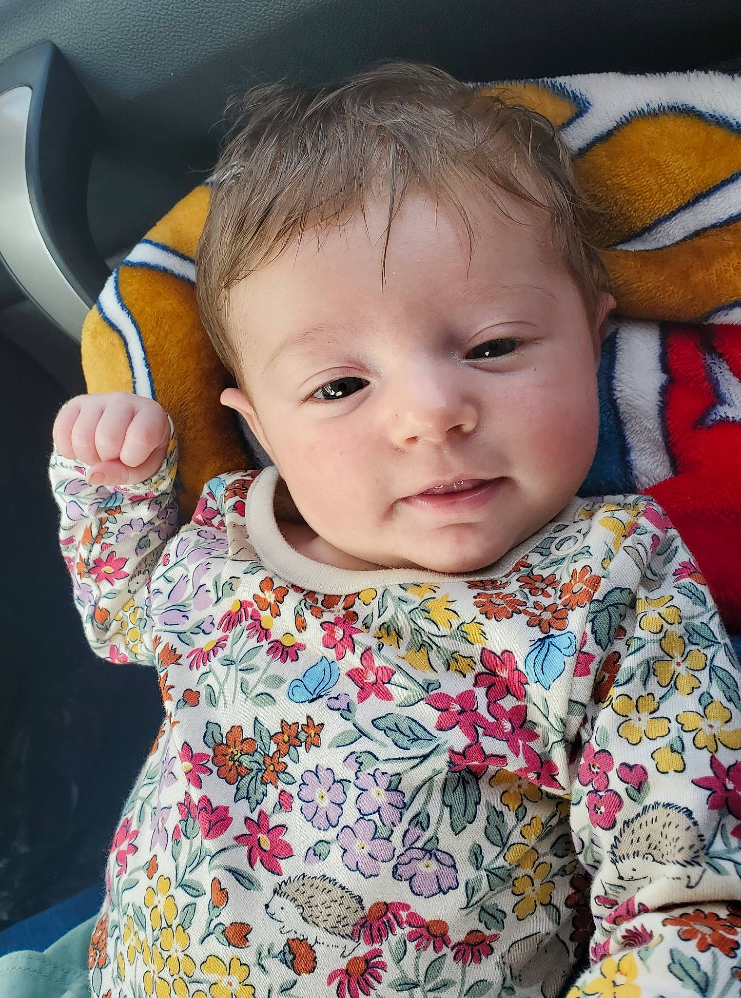 Austin is registered to the contest to win money with this photo: baby, baby_toddler_clothing, cheek, child, chin, eye, eyelash, face, facial_expression, gesture, hairstyle, head, iris, lip, neck, nose, person, product, skin, sleeve