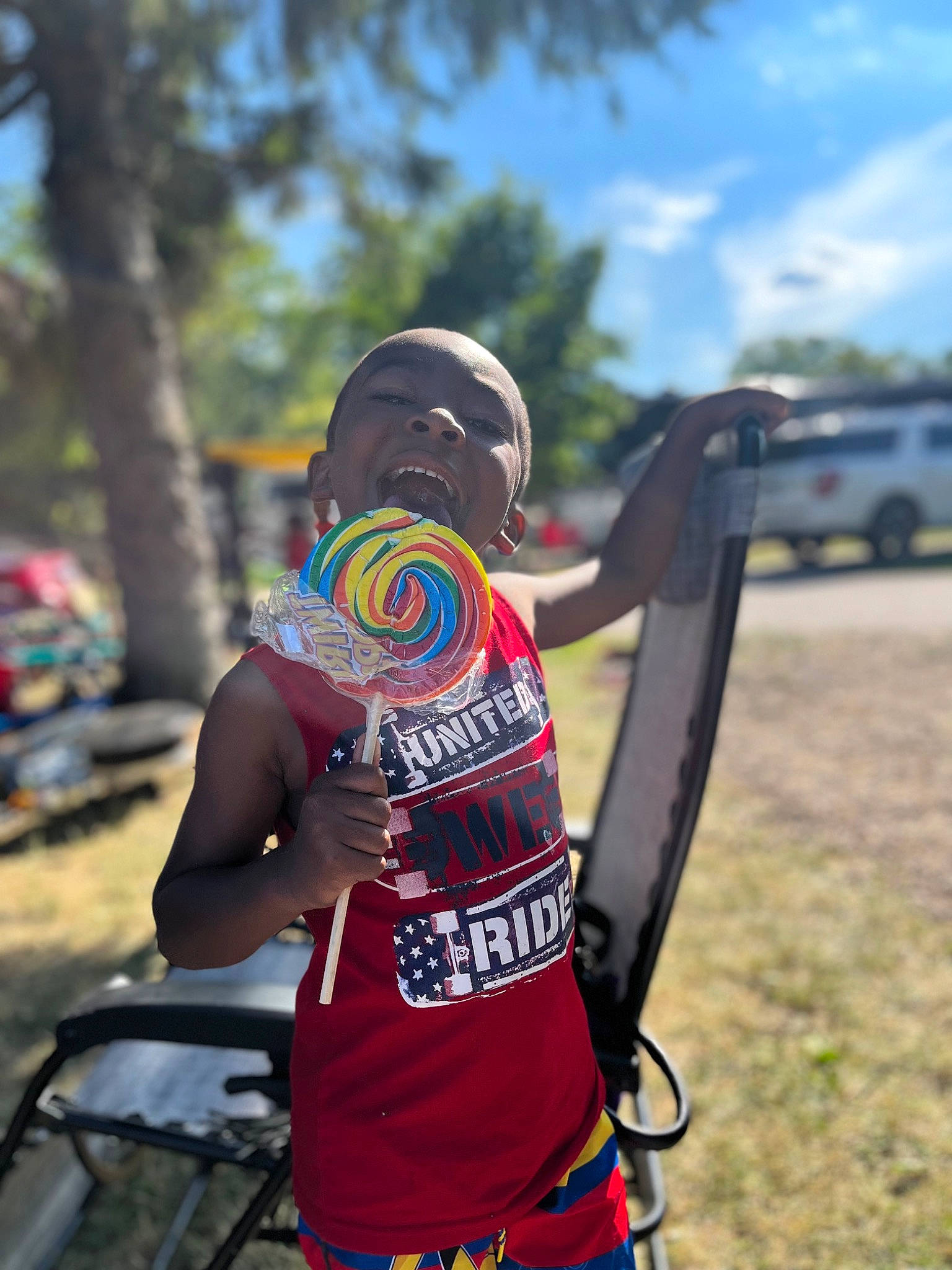 Jabari joined the competition — help win amazing prizes! automotive_tire, bicycle_clothing, bicycle_frame, bicycle_handlebar, bicycle_tire, bicycles_equipment_and_supplies, competition_event, cycling, eyewear, leisure, motor_vehicle, person, personal_protective_equipment, racing, recreation, shorts, sky, sports_equipment, sportswear, t_shirt