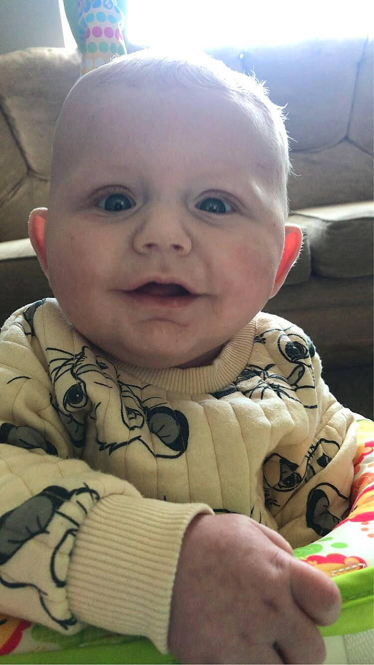 Leo-james is registered to the contest to win money with this photo: baby, baby_products, baby_toddler_clothing, car_seat, cheek, child, chin, comfort, eyebrow, fun, happy, iris, lip, mouth, nose, person, sitting, skin, sleeve, smile