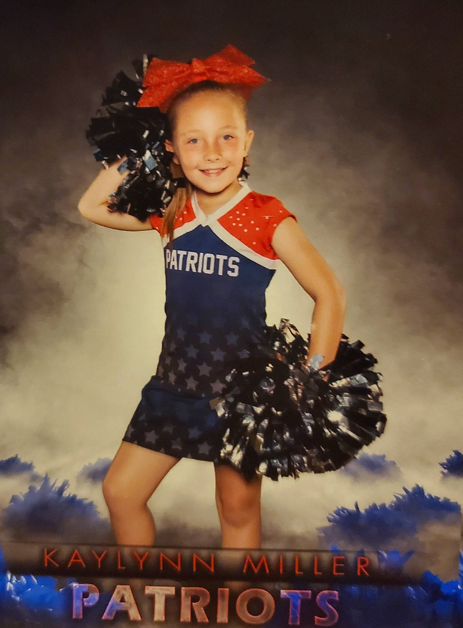 Kaylynn joined the competition — help win amazing prizes! cheerleading, cheerleading_uniform, child, child_model, clothing, costume, dancer, joy, performance, person, photography, sky, smile, sports_uniform, talent_show, toddler