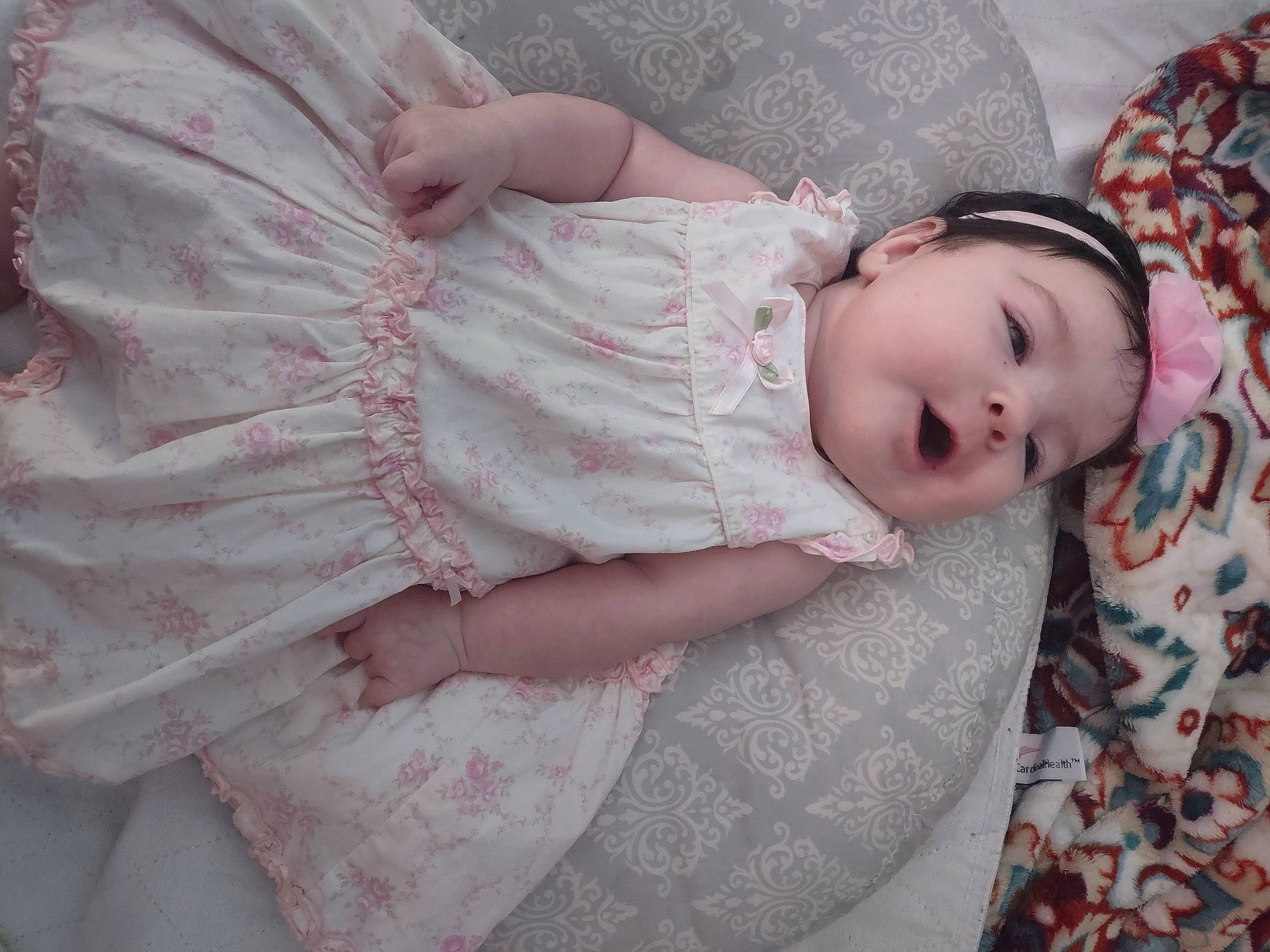 Bristol joined the competition — help win amazing prizes! baby, baby_toddler_clothing, cheek, comfort, dress, embellishment, eye, eyelash, grass, head, headgear, human_body, iris, linens, lip, pattern, person, pink, skin, sleeve