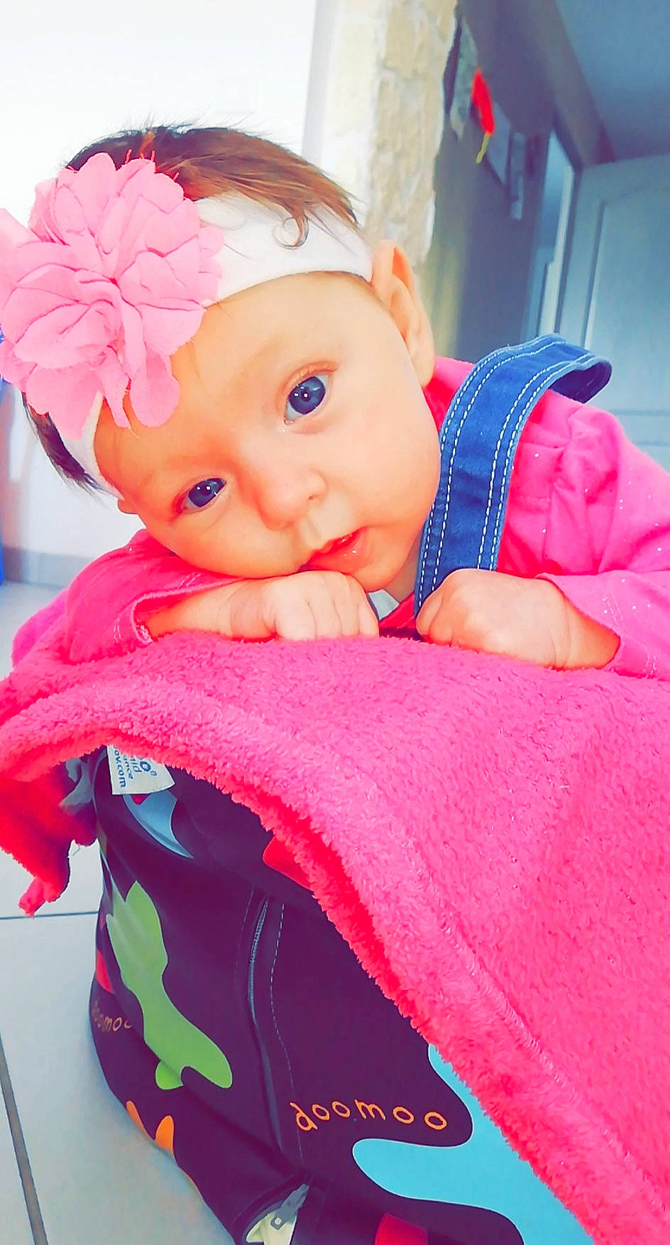 Mila participe au concours pour gagner de l'argent avec cette photo : baby, baby_products, cheek, child, doll, hair_accessory, head, headgear, headwear, person, pink, product, skin, textile, toddler, toy