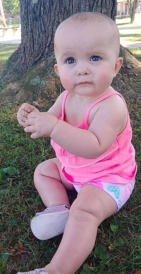 Maci joined the competition — help win amazing prizes! baby, baby_toddler_clothing, child, finger, grass, hand, leg, person, pink, plant, sitting, skin, smile, summer, thumb, toddler, tree