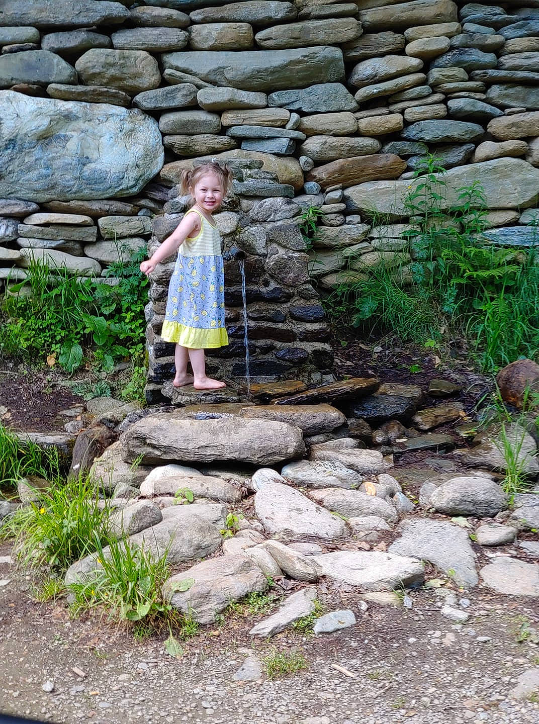Toni joined the competition — help win amazing prizes! child, cobblestone, dress, flagstone, garden, grass, joy, leisure, person, photograph, photography, plant, rock, stone_wall, tree, vacation, wall