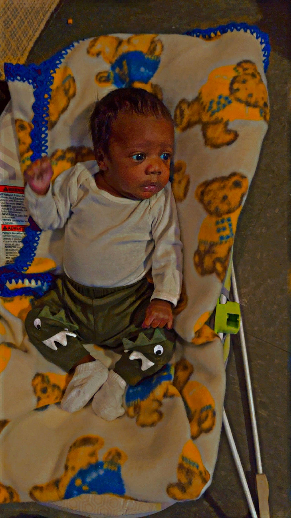 Amaud is registered to the contest to win money with this photo: baby, baby_products, baby_safety, baby_toddler_clothing, baby_toys, blue, child, comfort, fun, head, leisure, linens, person, play, product, recreation, room, sitting, t_shirt, textile