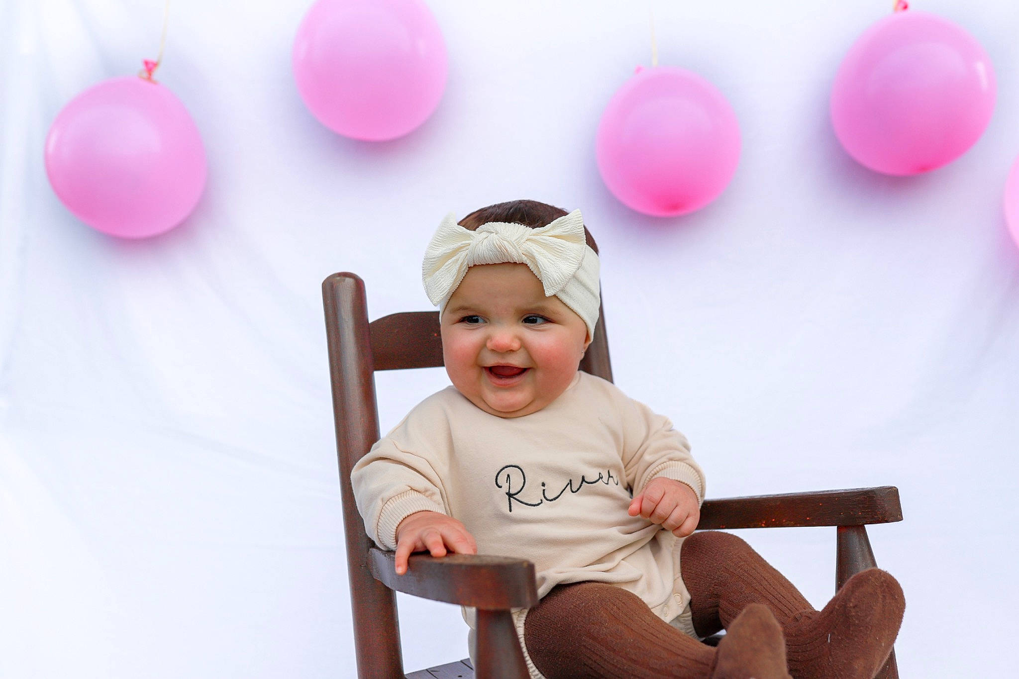 River joined the competition — help win amazing prizes! arm, baby_toddler_clothing, balloon, chair, child, fun, gesture, happy, headwear, joy, magenta, organ, party_supply, people, person, photograph, pink, product, red, smile