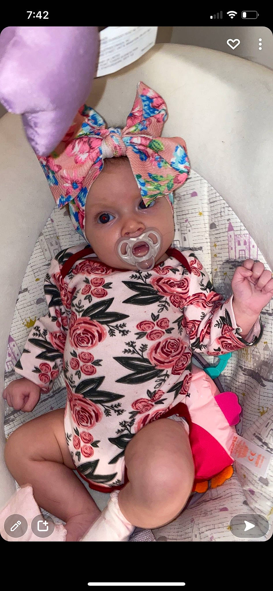 Emerlynn joined the competition — help win amazing prizes! baby, baby_toddler_clothing, cheek, child, dress, eye, flower, head, headpiece, headwear, human_body, linens, magenta, pattern, person, pink, sitting, skin, sleeve, textile