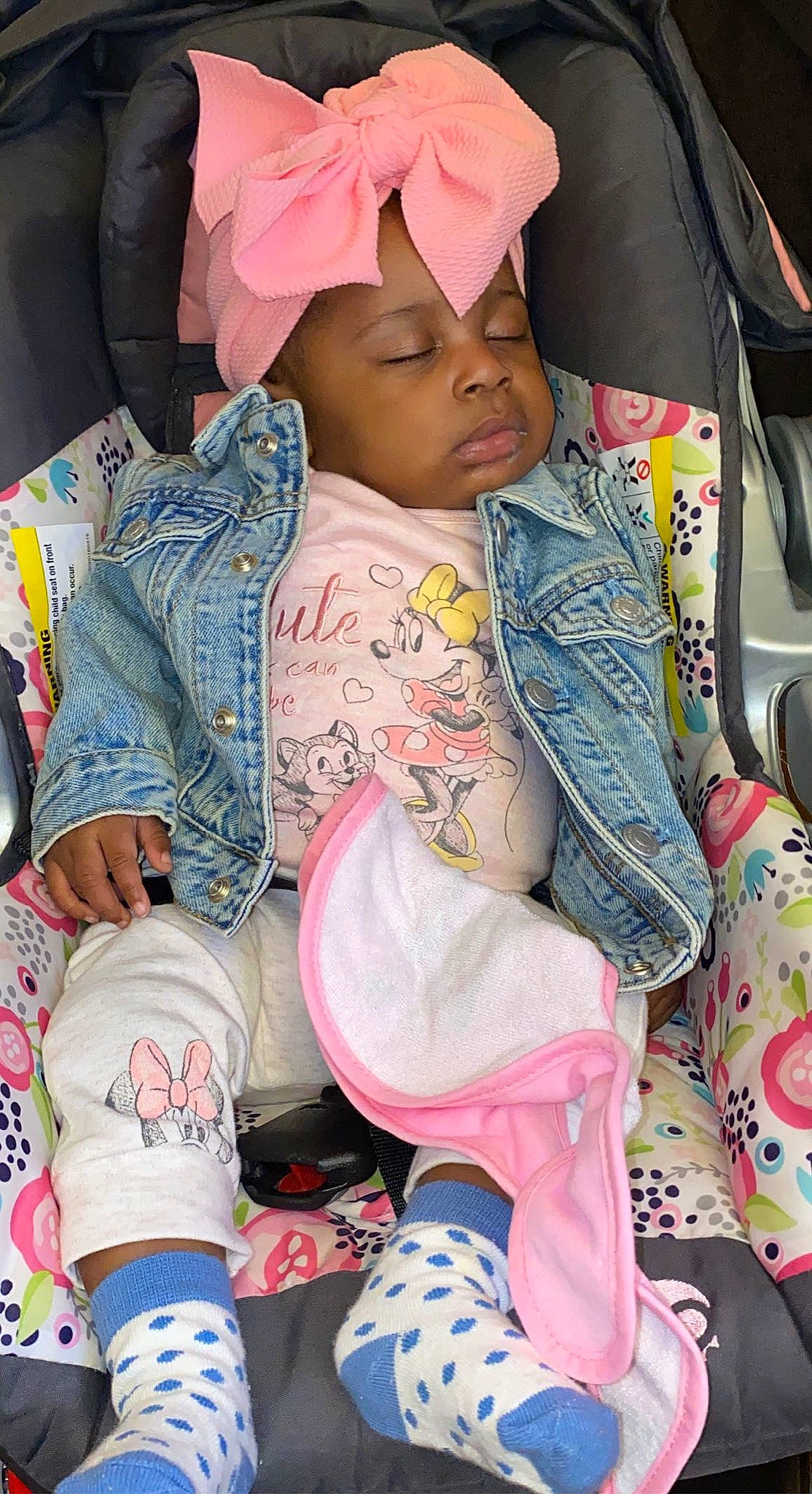 Nailani joined the competition — help win amazing prizes! baby, baby_products, baby_toddler_clothing, car_seat, cheek, cool, eye, eyelash, fashion_accessory, head, headwear, linens, pattern, person, pink, skin, sleeve, street_fashion, t_shirt, textile