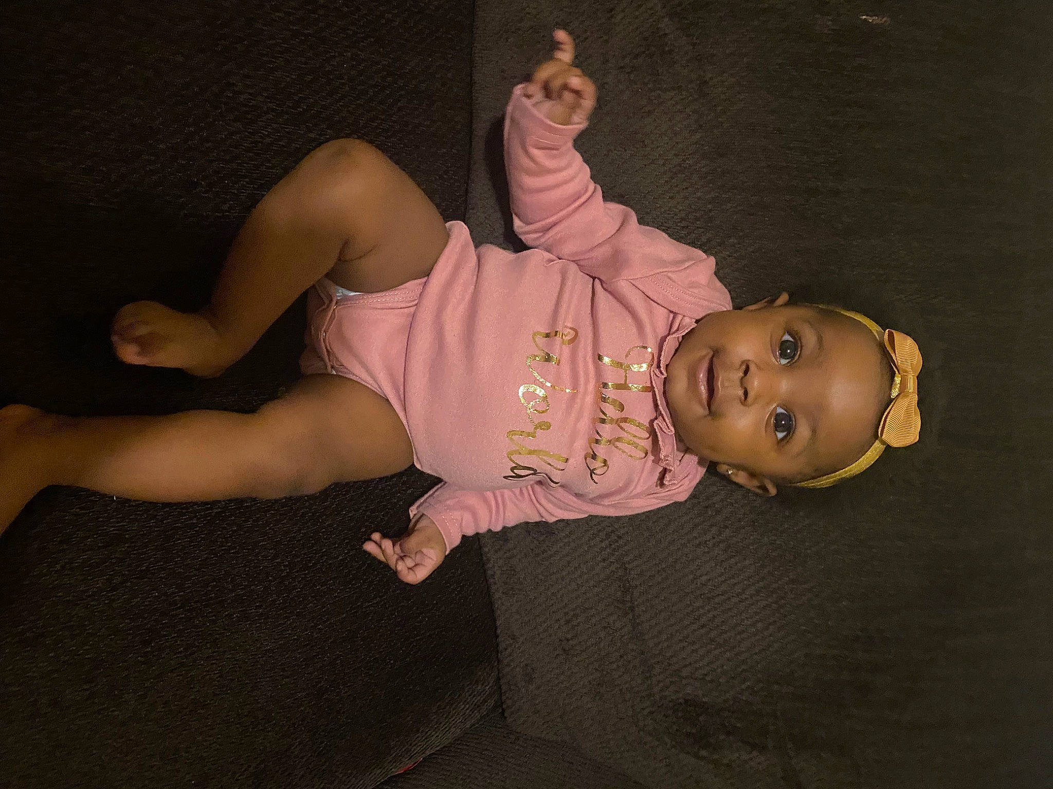 Nailani joined the competition — help win amazing prizes! abdomen, baby, baby_toddler_clothing, cheek, child, costume, elbow, flash_photography, foot, hat, human_leg, knee, person, sitting, skin, sleeve, sock, thigh, toddler, wood