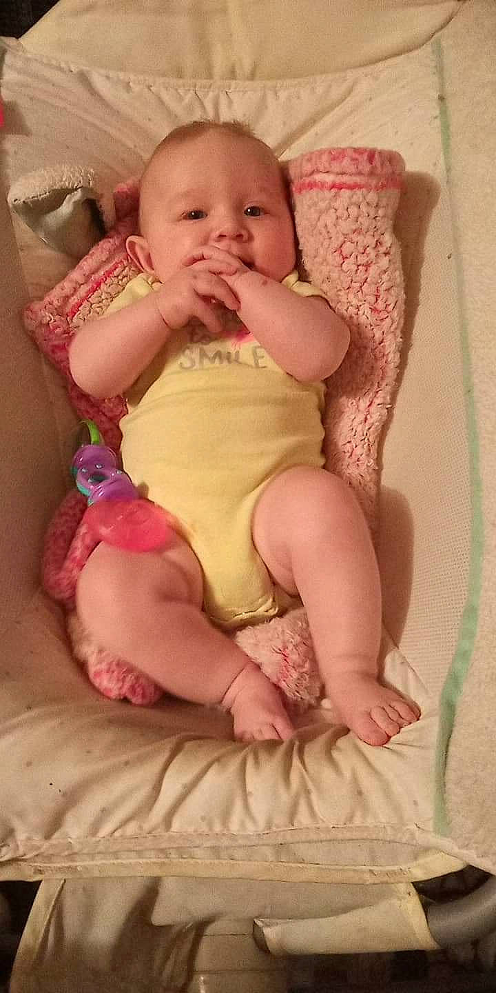 Cypress is registered to the contest to win money with this photo: arm, baby_toddler_clothing, cheek, chin, comfort, eye, face, facial_expression, hand, head, human_body, iris, leg, lip, mouth, organ, person, skin, sleeve, stomach