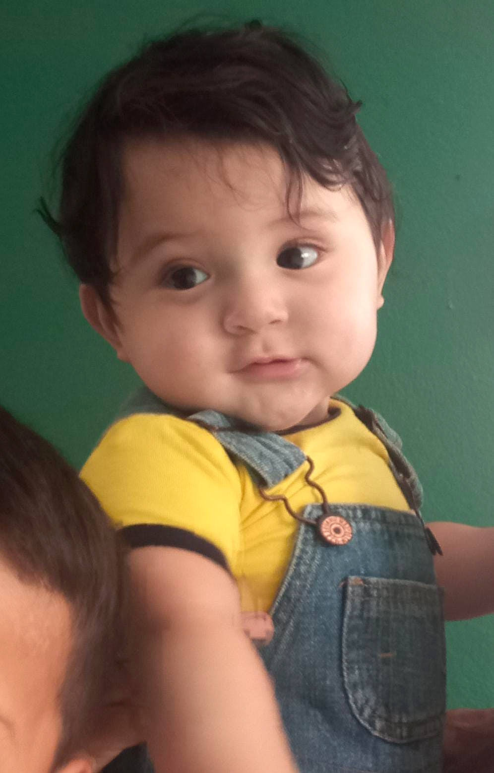 Joel is registered to the contest to win money with this photo: baby_toddler_clothing, black_hair, cheek, chin, eyebrow, eyelash, forehead, gesture, hair, hairstyle, happy, iris, lip, mammal, mouth, neck, nose, person, skin, sleeve