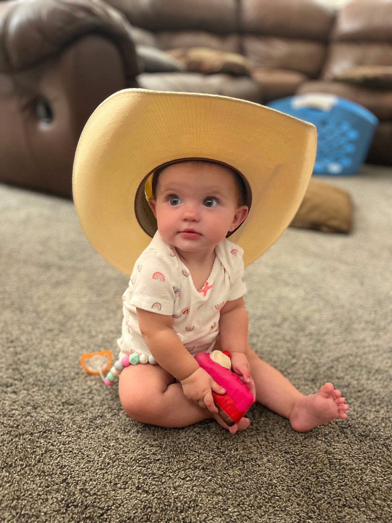 Lillie is registered to the contest to win money with this photo: baby_toddler_clothing, child, comfort, eye, face, fedora, fun, grass, happy, hat, headgear, human_body, leisure, lip, mouth, nose, people, person, sun_hat, toddler