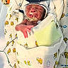 baby, bed, blanket, closeup, clothing, cute, delicate, face, hat, healthcare, hospital, infant, lion_print, medical_tubes, newborn, patient, portrait, resting, swaddled, wrapped