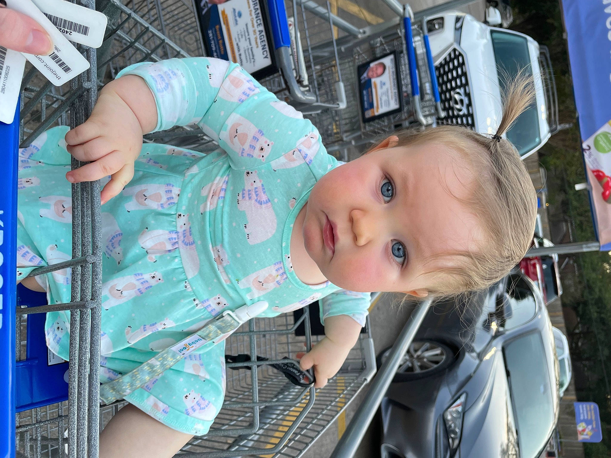 Everly is registered to the contest to win money with this photo: auto_part, automotive_design, automotive_exterior, automotive_lighting, automotive_tire, blue, bumper, car, family_car, fun, motor_vehicle, person, personal_luxury_car, sunglasses, tire, toddler, tree, trunk, vehicle, vehicle_door