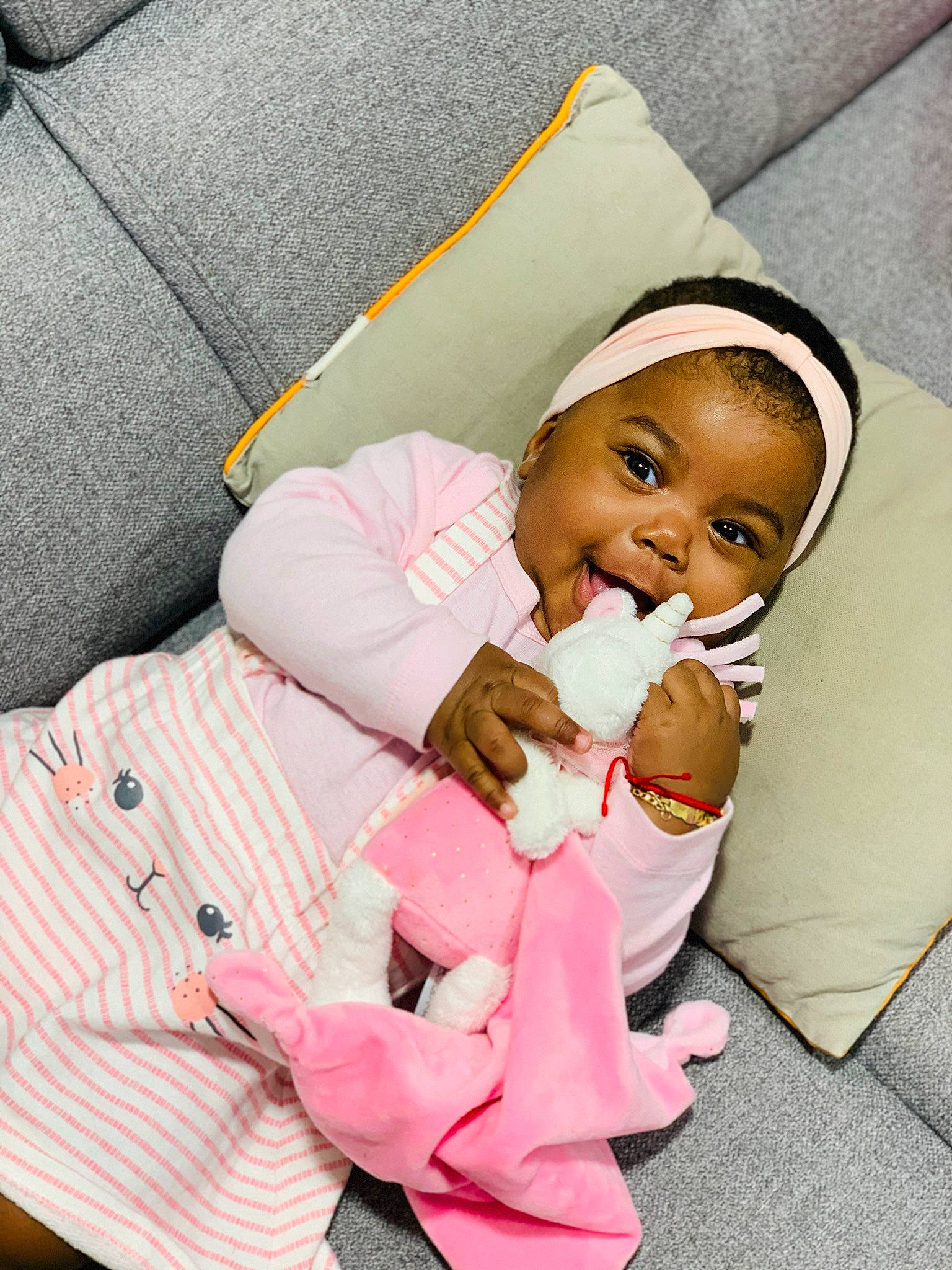 Joyce participe au concours pour gagner de l'argent avec cette photo : baby, birth, child, comfort, headwear, person, pink, product, toddler