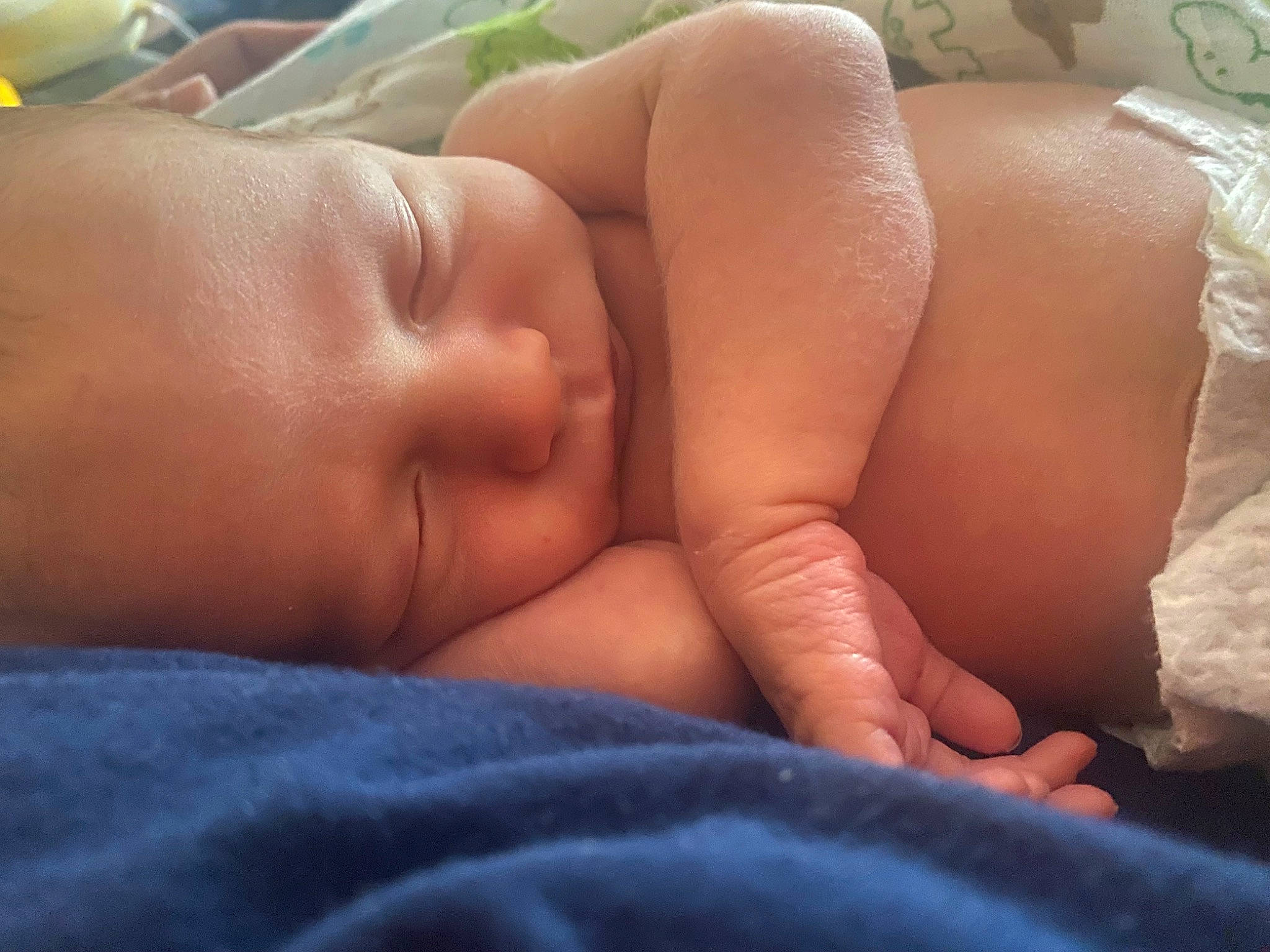 Emmitt is registered to the contest to win money with this photo: baby, baby_sleeping, bedtime, cheek, chest, clock, comfort, eyebrow, eyelash, finger, head, headgear, iris, linens, mouth, nap, nose, person, skin, thumb