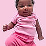 Charlotte Elizabeth joined the competition — help win amazing prizes! baby, child, smiling, pink_clothing, infant, cute, portrait, happy, fist, pastel_background, closeup, person, young_child, casual_wear, indoor, skin, head, face, sleeve, pants