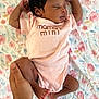 Charlotte Elizabeth joined the competition — help win amazing prizes! baby, newborn, sleeping, onesie, pink_clothing, hand, leg, foot, skin, face, infant, floral_blanket, pattern, cute, resting, peaceful, human, portrait, closeup, soft