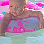 baby, child, inflatable_ring, pool, water, pink, starfish, seashell, summer, swimming, toddler, sunlight, outdoor, cute, play, fun, skin, arm, face, expression