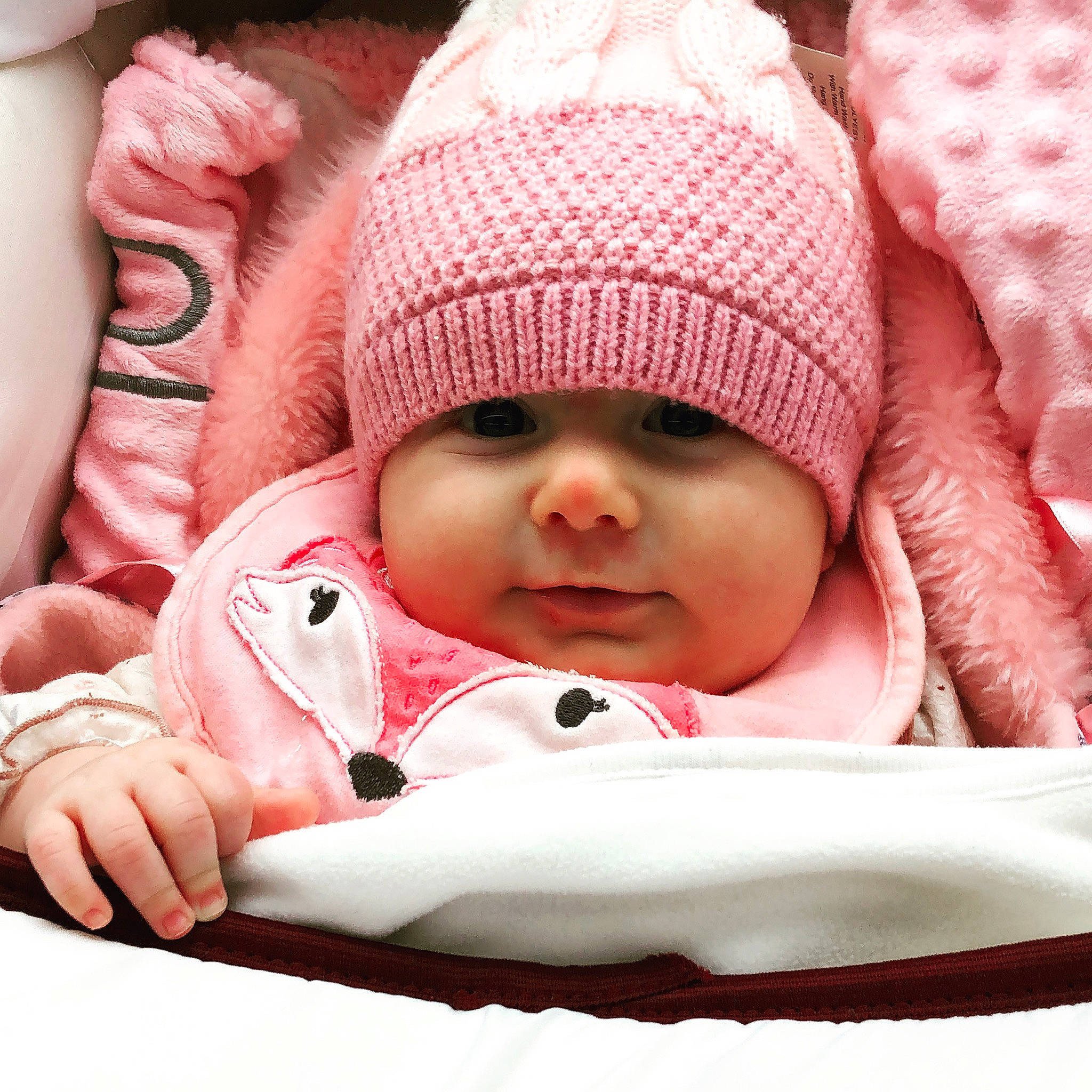 Anabella joined the competition — help win amazing prizes! baby, baby_products, baby_sleeping, beanie, bonnet, cheek, child, headgear, headwear, knit_cap, person, pink, skin, toddler, wool