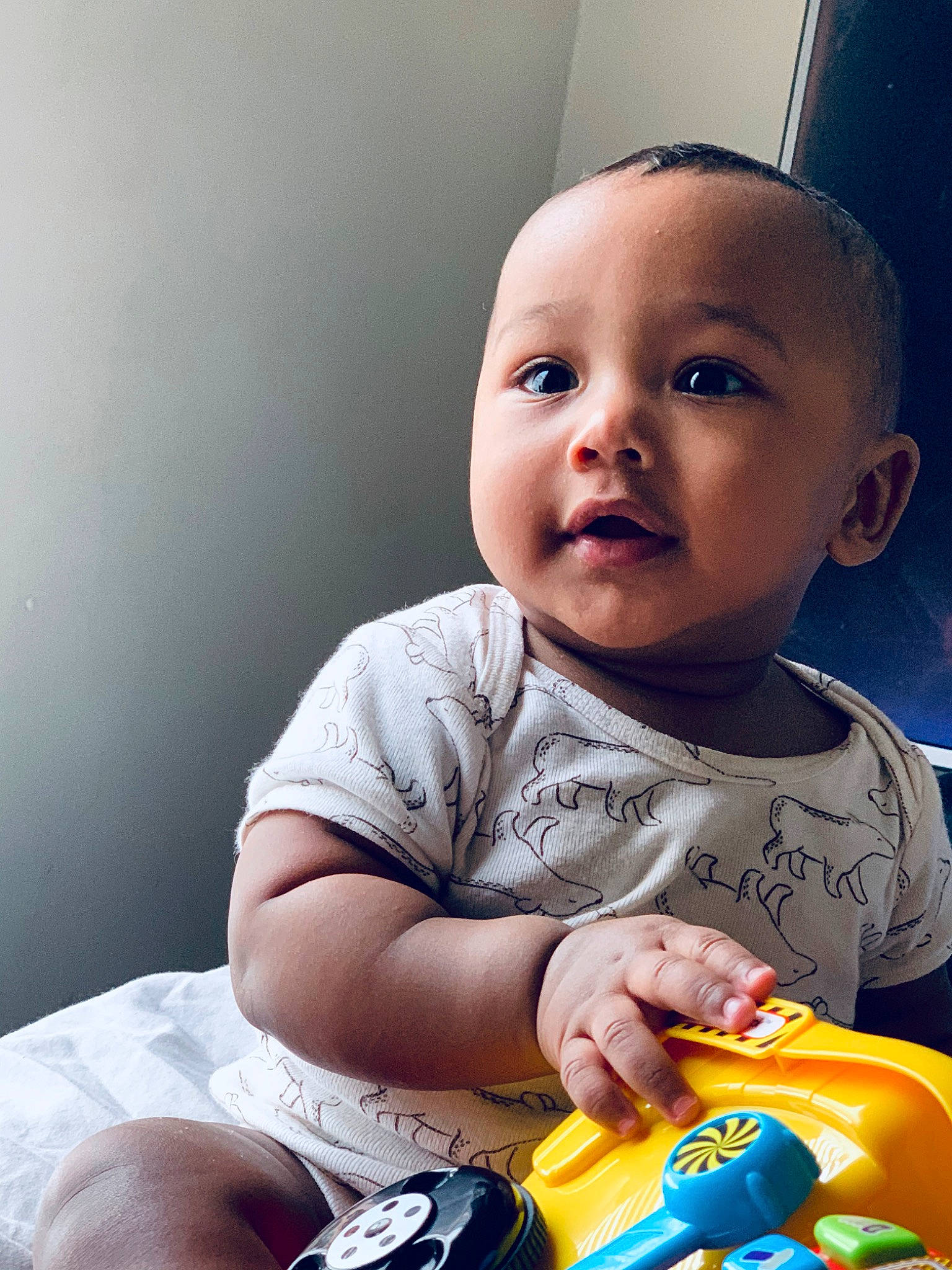 Jaxxon joined the competition — help win amazing prizes! baby, baby_playing_with_toys, cheek, child, eye, face, fun, happy, head, lip, mouth, nose, person, photography, play, sitting, skin, smile, toddler, tummy_time